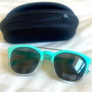 Native sixty six polarized sunglasses teal/clear